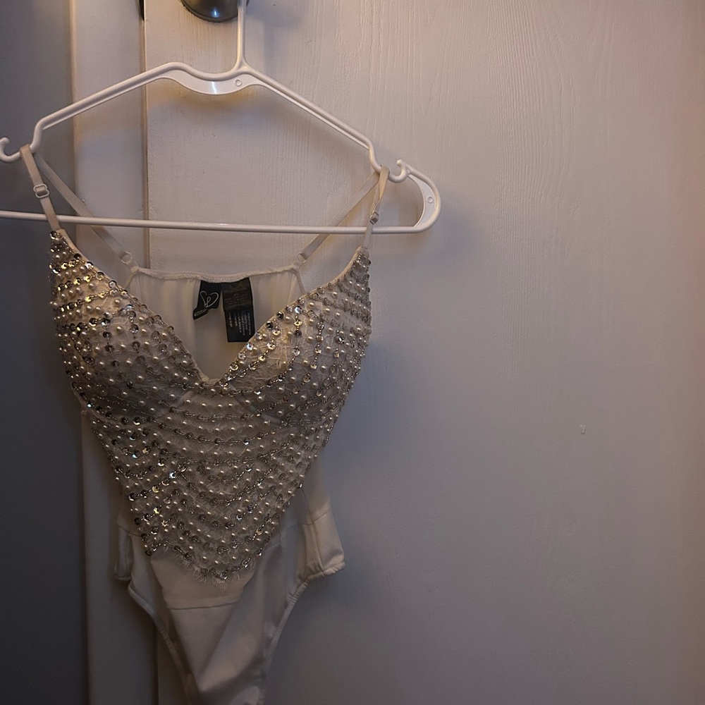 Pearl and gem body suit from Windsor never been worn tags still size(small/xs)